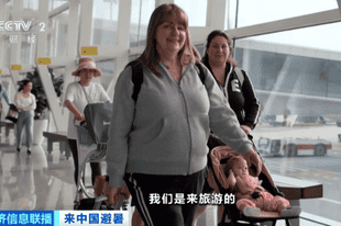 赴华机票销量暴涨 老外为何扎堆来中国“避暑”