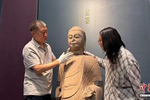山西汾阳村民捐赠佛首为北齐造像 与馆藏佛立像高度吻合