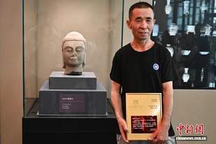“山西村民挖出1400年前佛首”:已身首合璧,村民获奖10000元