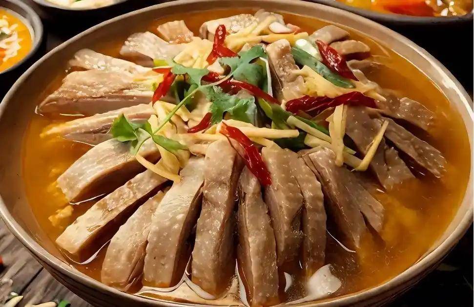 吕文扬:把一锅固始鹅块熬成浸满乡土的老风味