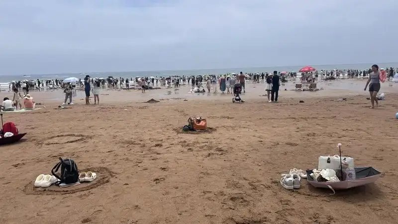 沙滩上的“西游结界”：一圈沙痕，是一座城市的信任底色